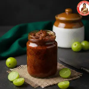 Amla pickles jar with amala fruits